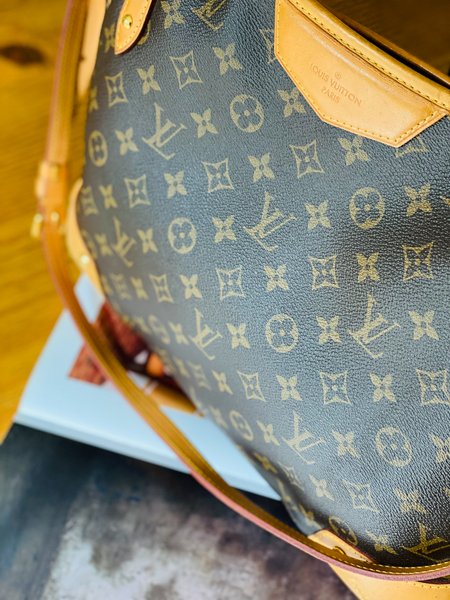 retiro louis vuitton bolsa