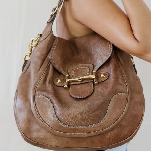 brown leather luggage bolsa