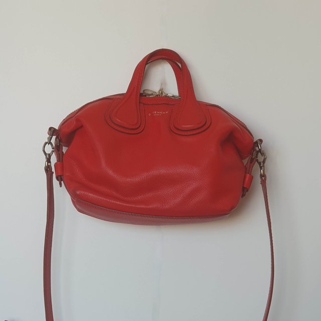 small red leather bolsa