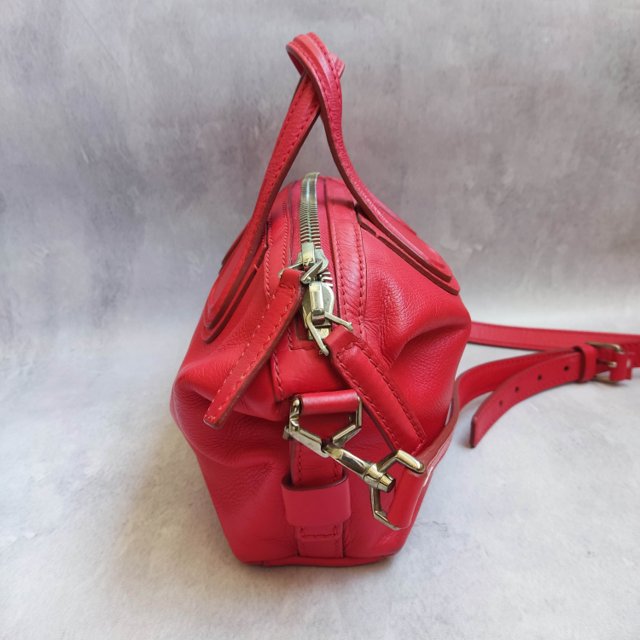 small red leather bolsa