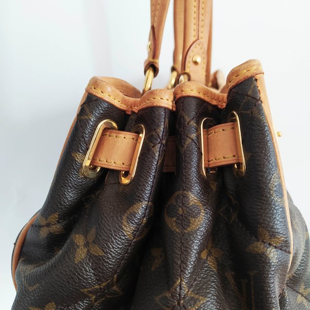 used lv bolsas near me