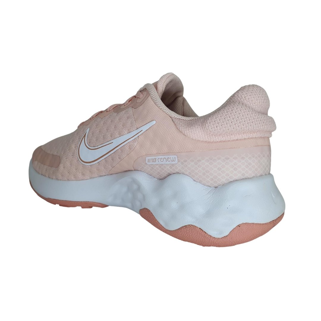 nike running renew run sneakers in rose gold