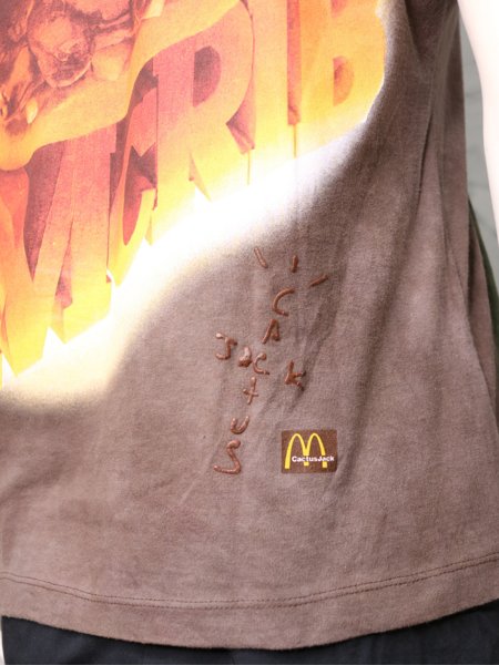 トラヴィススコット　CACTUS JACK　McDonald's　XL Camiseta Travis Scott Cactus Jack x MCDonalds Marrom | Zivē Club