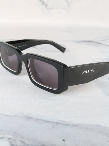 Óculos de Sol Prada SPR 06Y 53021 09Q-5SO 145 3N Preto | Zivē Club