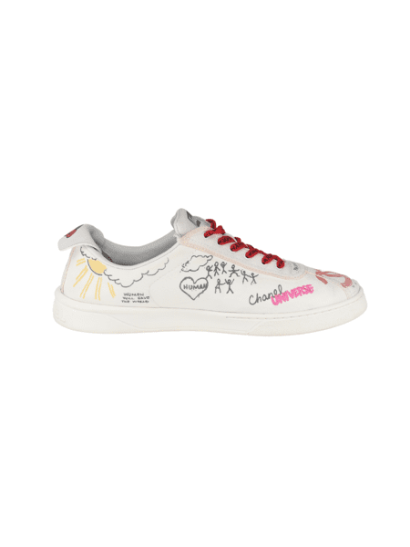 Tenis chanel pharrell top