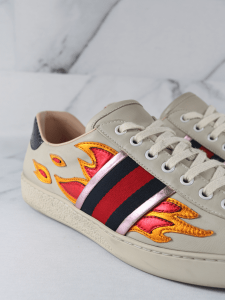 Gucci ace store with flames