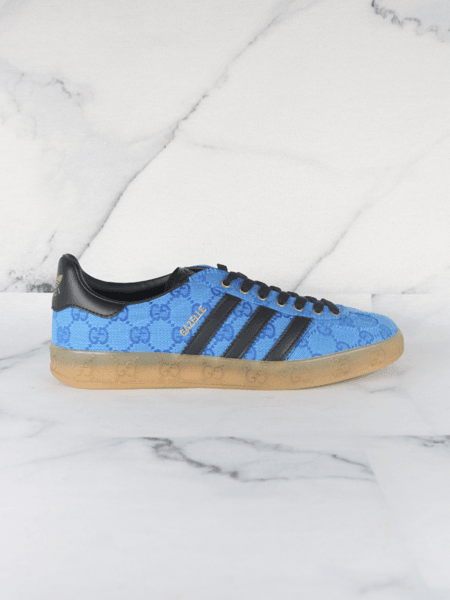 GOD-003 デニス　GOCCIA Tênis Gucci x Adidas Gazelle Blue Core Black | Zivē Club