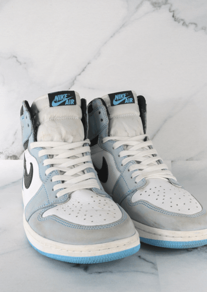 Tênis Nike Air Jordan 1 High University Blue | Zivē Club Tênis Nike Air Jordan 1 High University Blue | Zivē Club