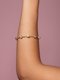 bracelete-com-cinco-zirconias-regulavel-grandes-folheado-em-ouro-18k-01-francisca