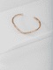 bracelete-tubo-em-v-liso-regulavel-folheado-em-ouro-18k-04-francisca