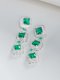 brinco-longo-com-zirconias-quadradas-verde-esmeralda-folheado-em-rodio-branco
